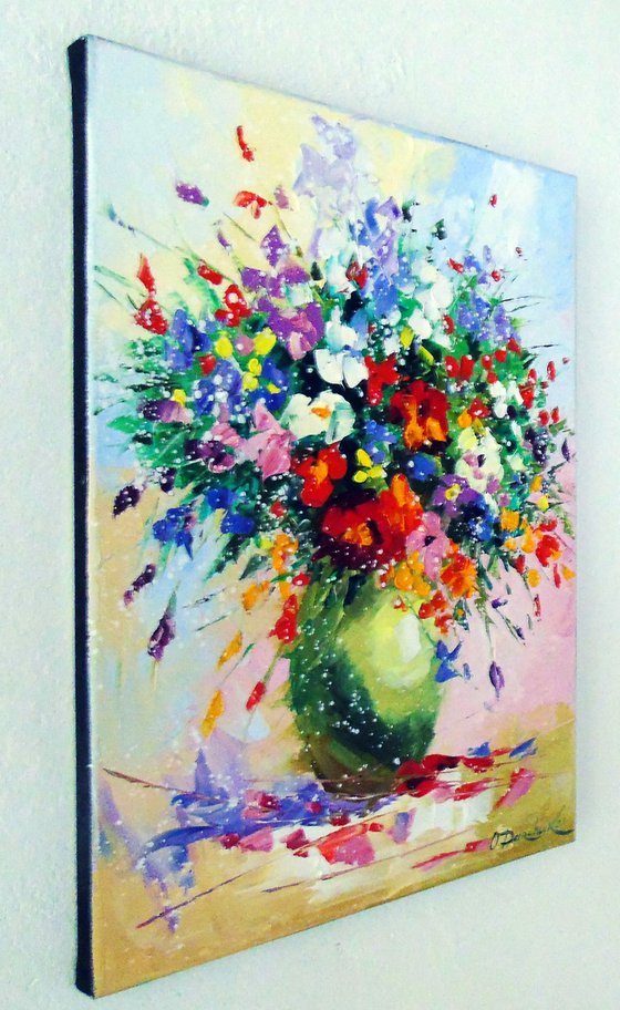 A bouquet of meadow flowers in a vase