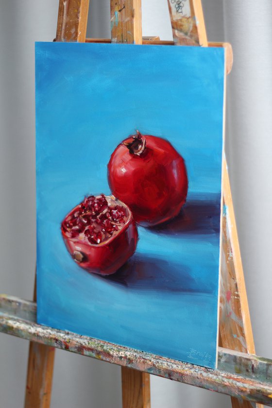 Pomegranate on a blue background