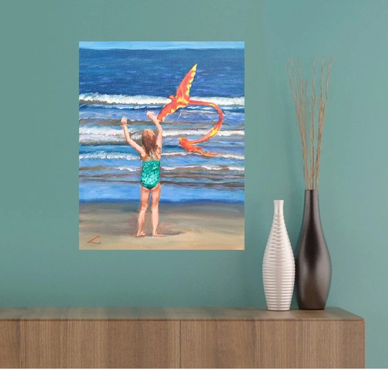 Girl with a kite at the sea