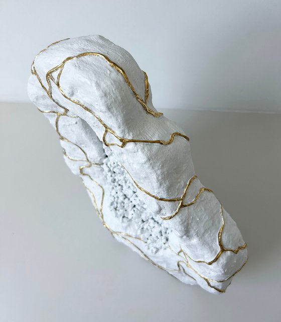 3D White geode with gold veins