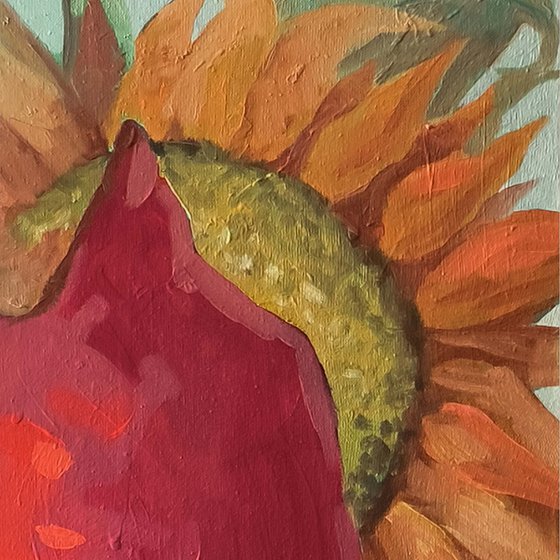 Rooster in sunflowers