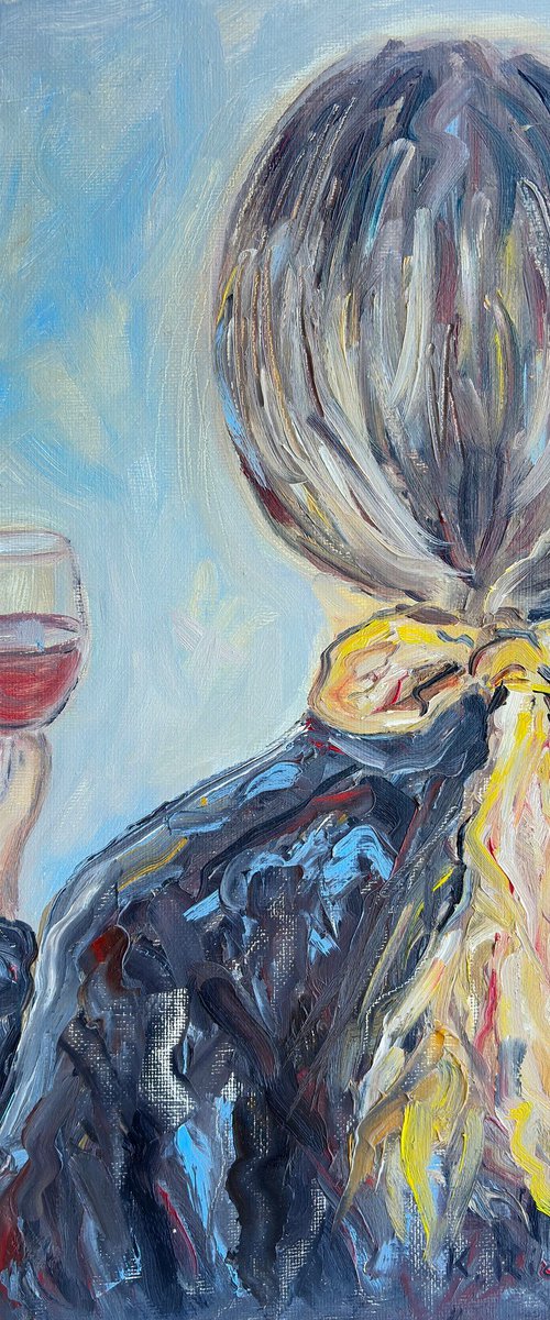 A Woman Holding a Glass of Wine by Katia Ricci