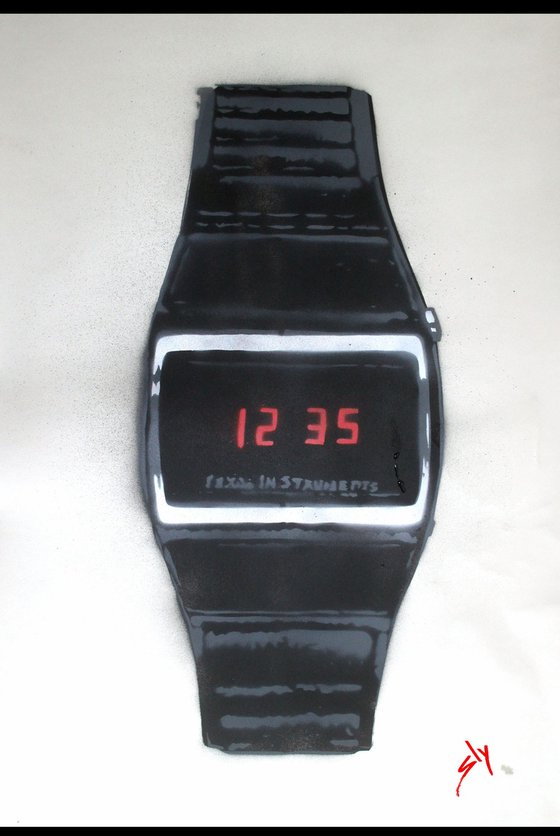Cheap digital watch by Texas Instruments (on plain paper).