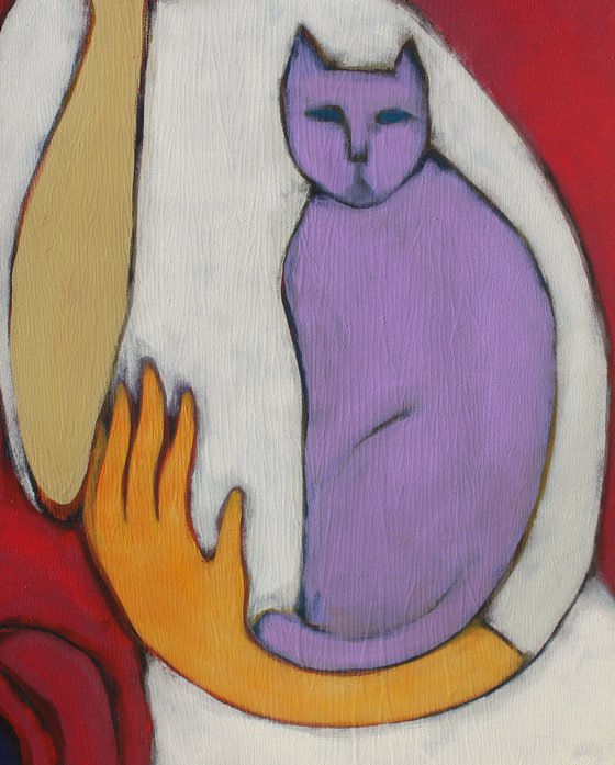 Portrait in a red chair.