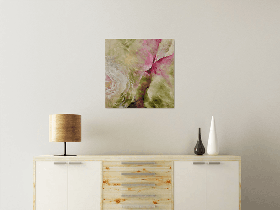 Butterfly hovering over a peony flower