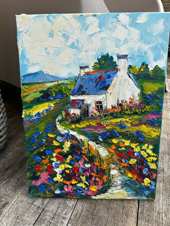 Old house with flowers