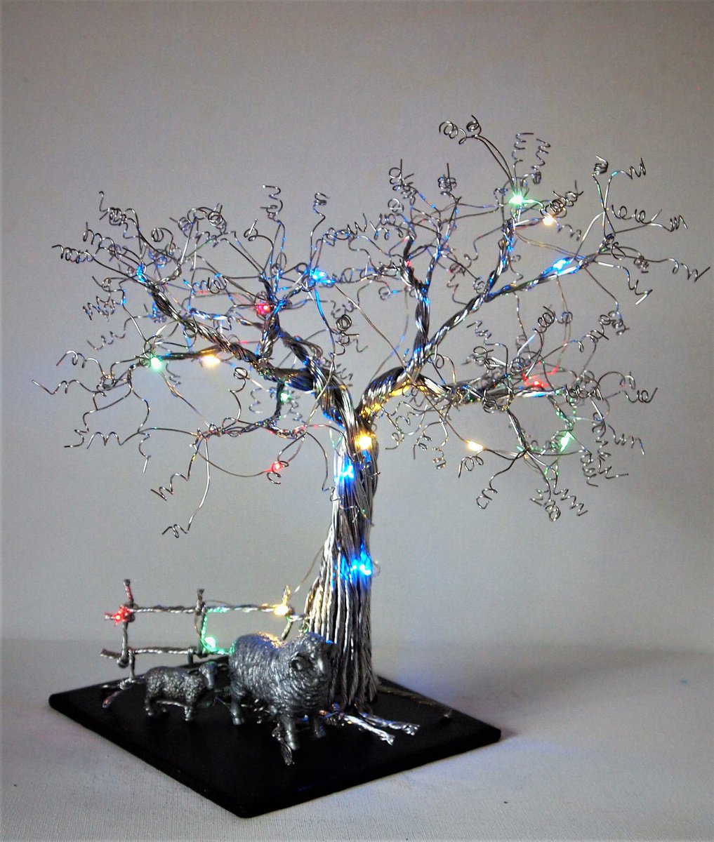 Silver wire tree sculpture with Sheep, fence and LED lights by Steph Morgan