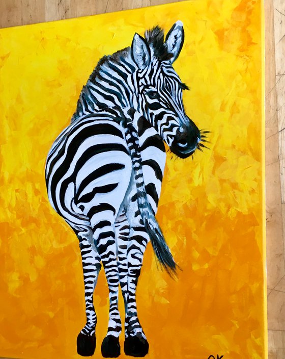 ZEBRA  on golden background.