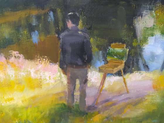 An artist near the lake