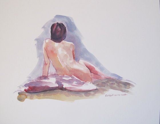 Seated female nude back view