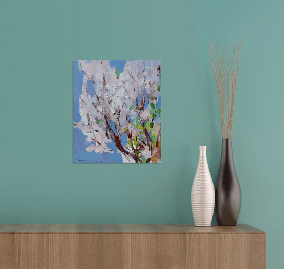 Blooming tree on blue. Original oil painting