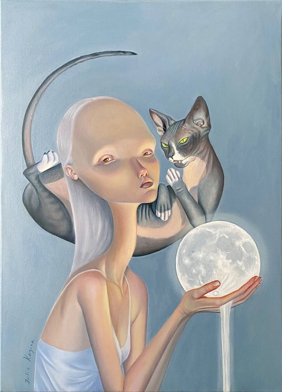 Girl with a sphinx cat