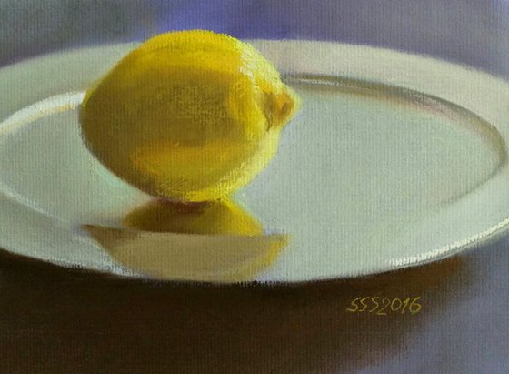 Lemon on the silver plate