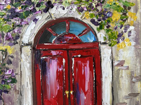 Red door with flowers