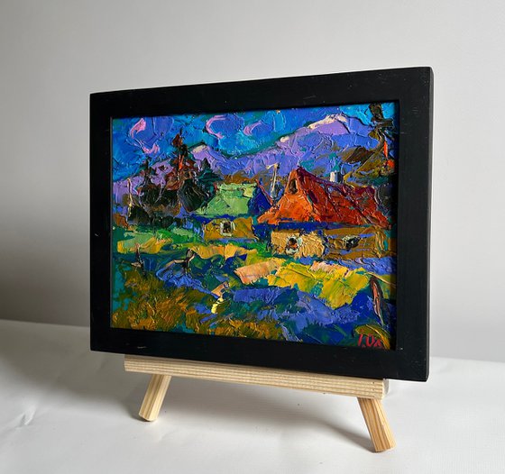 Village and blue mountains