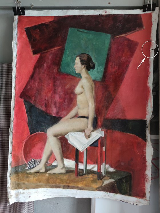 A nude on the chair.