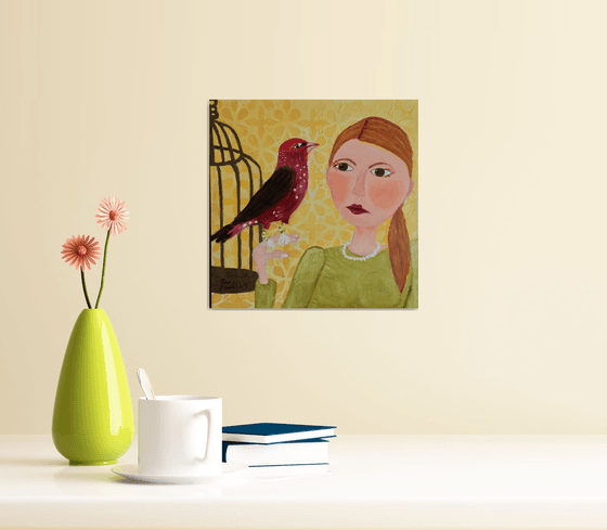 Woman and Strawberry Finch
