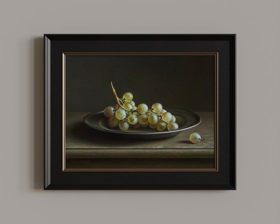 Grapes in a pewter plate