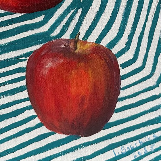 Red apples on green