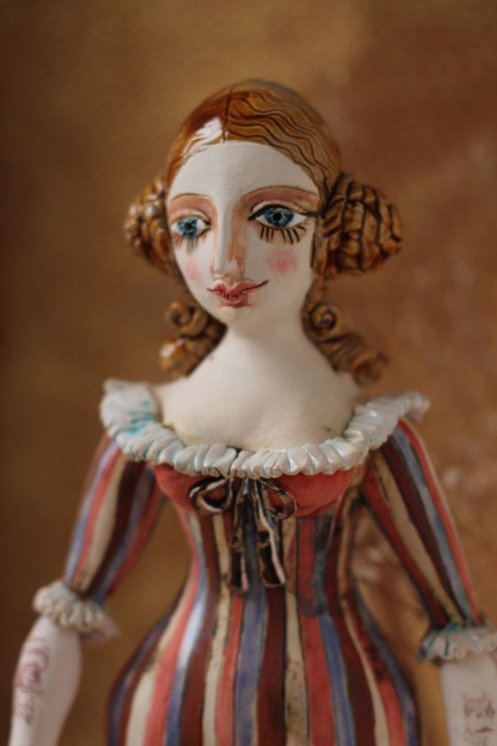 From the Naked clay series, Harlequine Girl. Wall sculpture by Elya Yalonetski