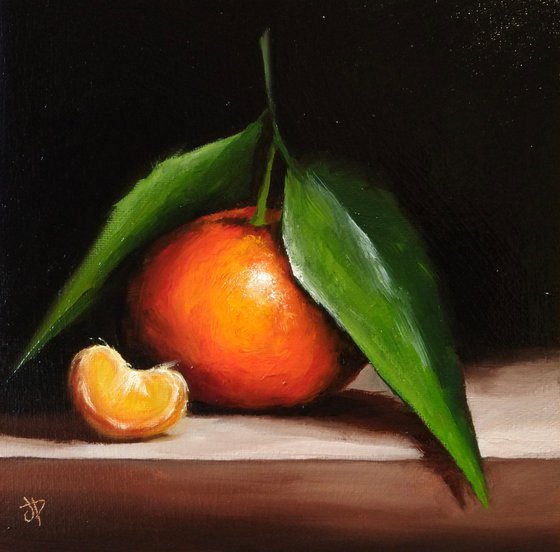 Clementine with segment still life