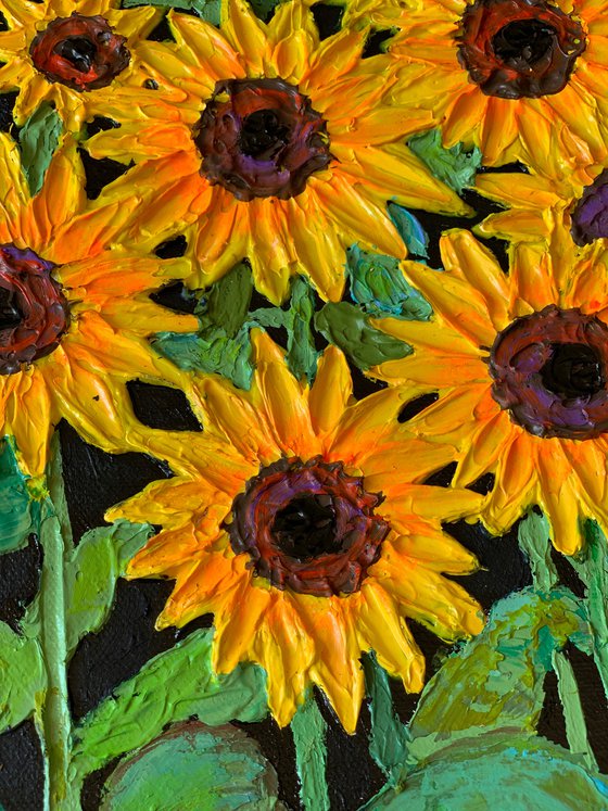 Sunflowers field at sunset