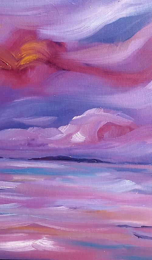 Sunrise over the distant Saltee Islands lights up the sea in a Pink glow by Niki Purcell