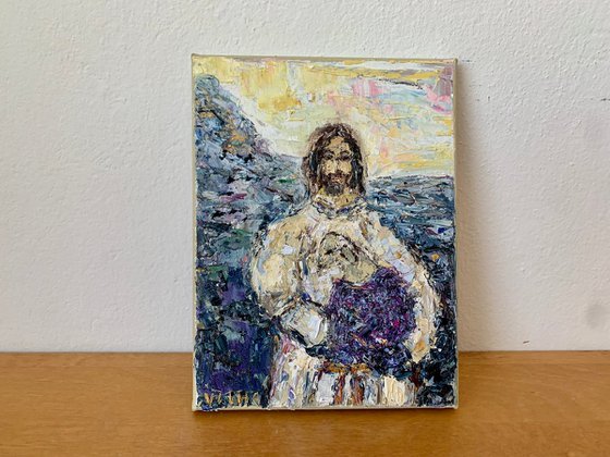 Jesus holding a lamb