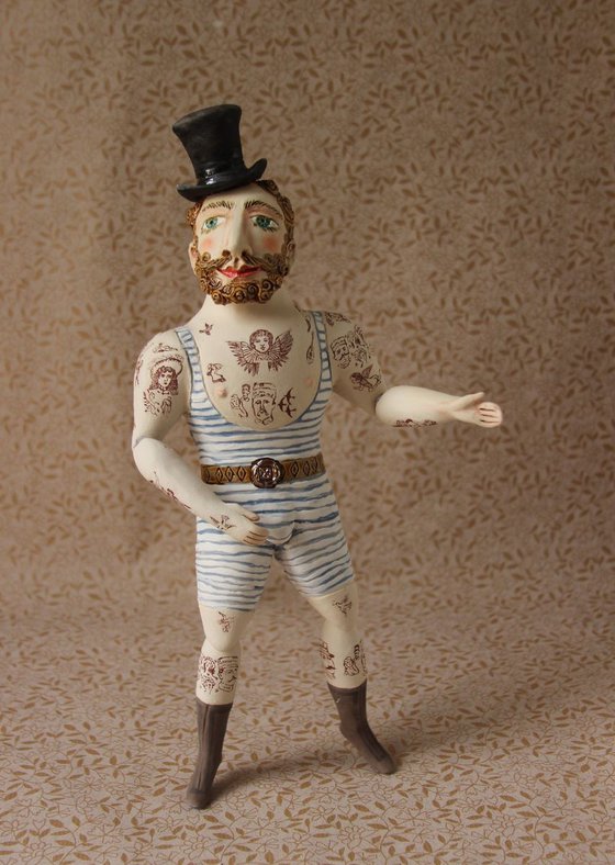 Circus athlete with hipster beard. Wall sculpture by Elya Yalonetski.