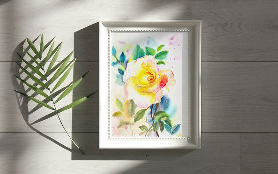 Yellow rose with leaves