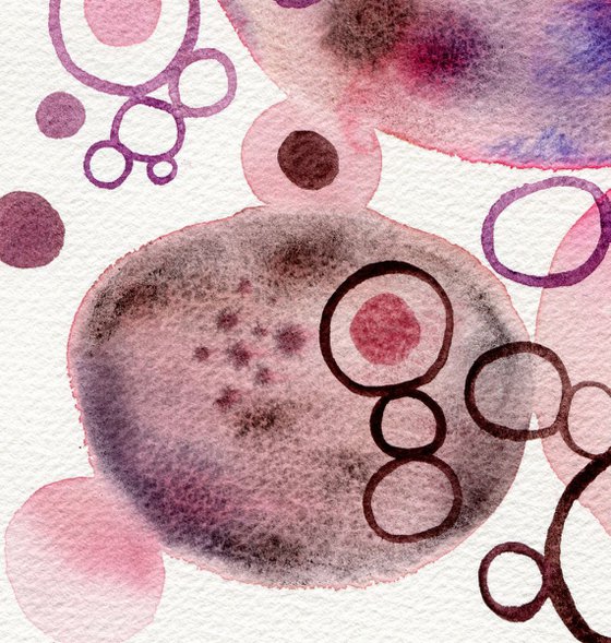 Abstract watercolor art with pink and violet circles
