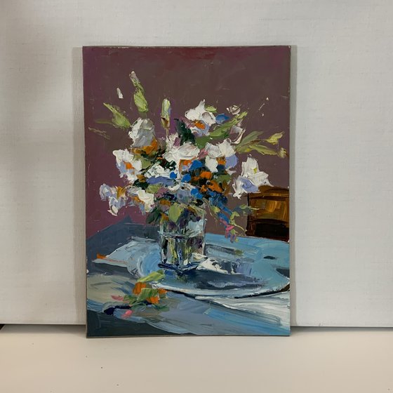 White flowers in a glass vase.