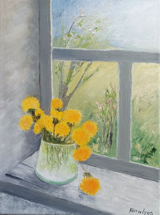 Spring with dandelions at the window