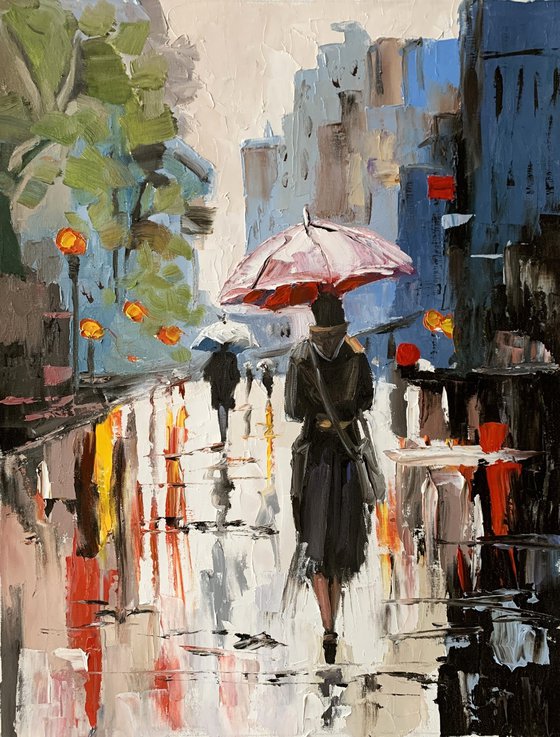 Woman in a rainy city.