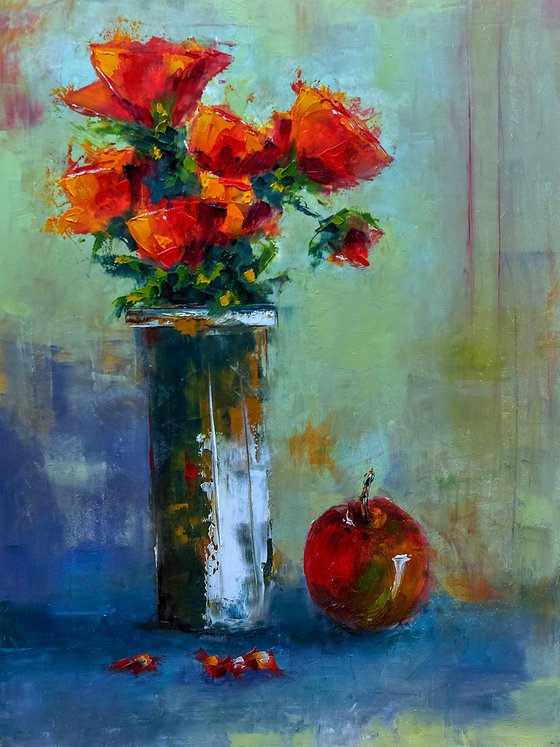 Still life with roses and apple.