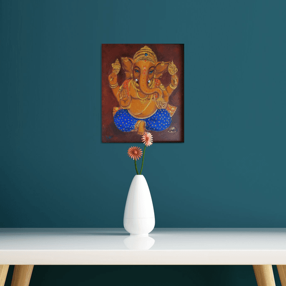 Lord Ganesh with blue eyes