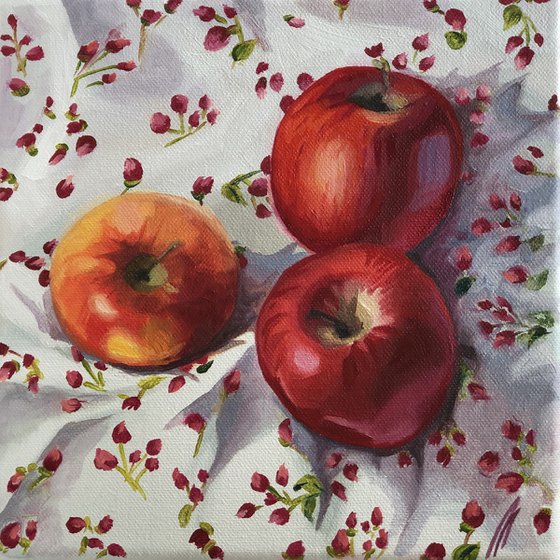 Apples on a floral background