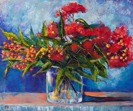 Red Flowers in a Glass Vase