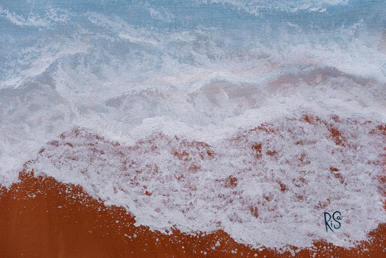 Coral sky and ocean wave