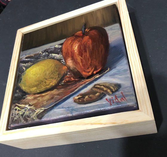 Apple, lemon and pecans - still life