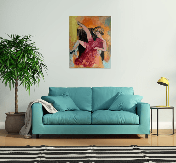 Woman sitting on the armchair