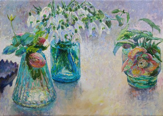 Flowers in blue glass