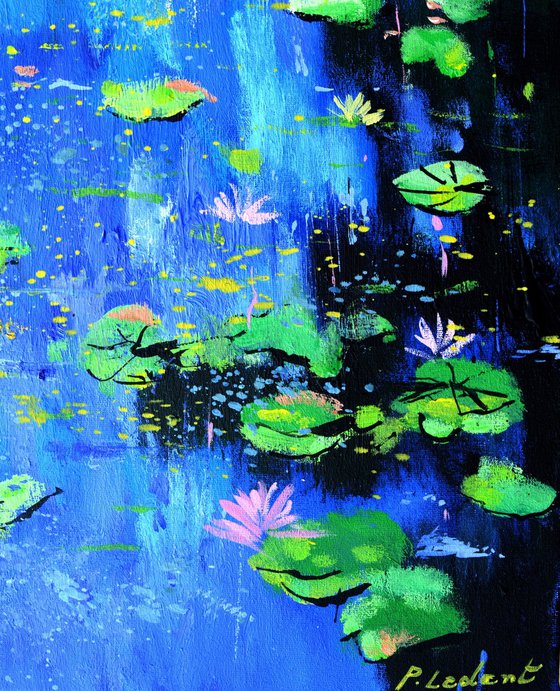 Waterlilies on a blue pond