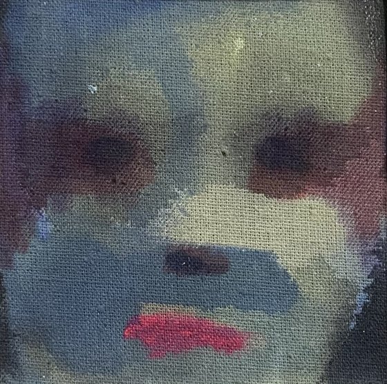 A Face Held in Colour