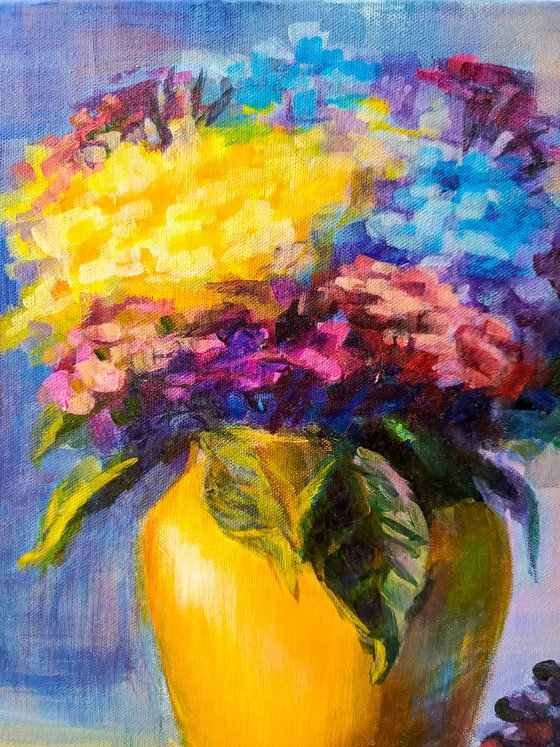 Flowers in a yellow vase