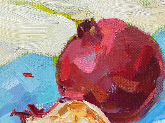 pomegranate on blue