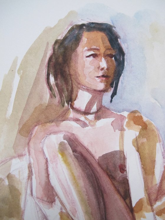 Draped seated female nude