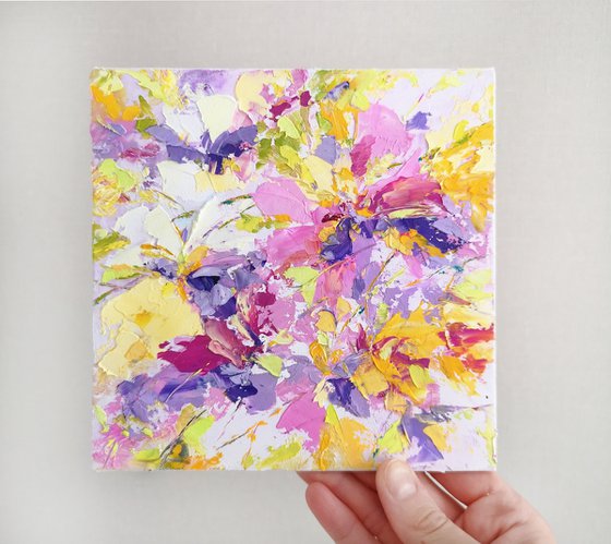 Small oil painting with colorful abstract flowers