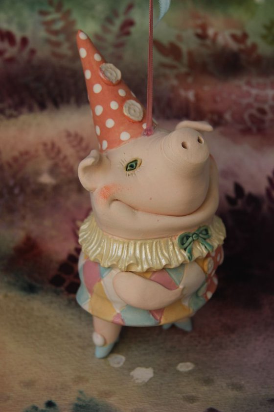 Little piggy in harlequin dress. Hanging sculpture, bell doll by Elya Yalonetski