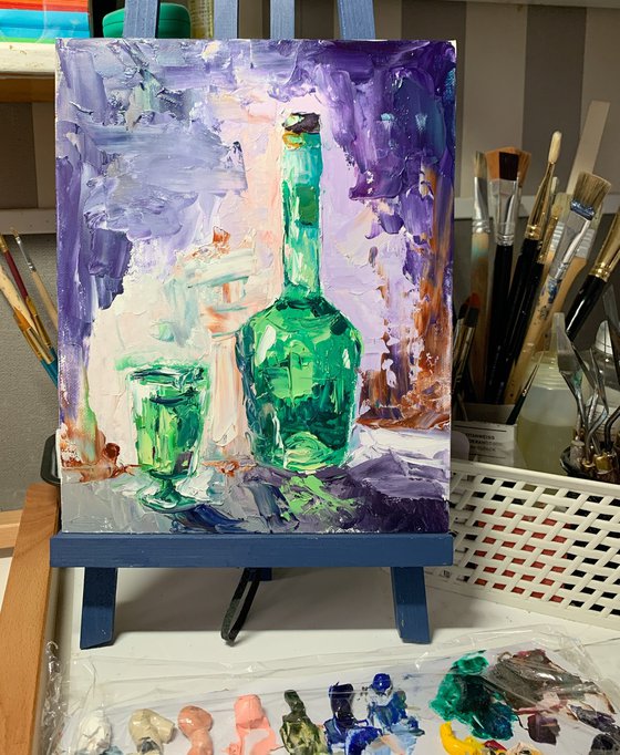 Green bottle of Brandy.